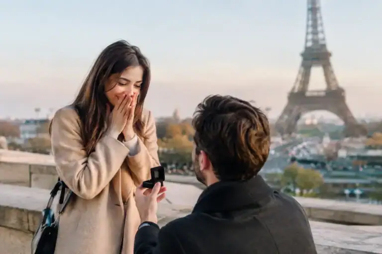 Romantic proposal in Paris with Eiffel Tower in background.